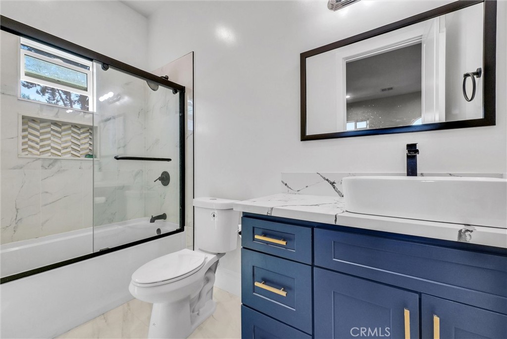 451 Avenida Esplendor Walnut, CA 91789 - Photo 36 of 51 a bathroom with a sink a toilet and shower