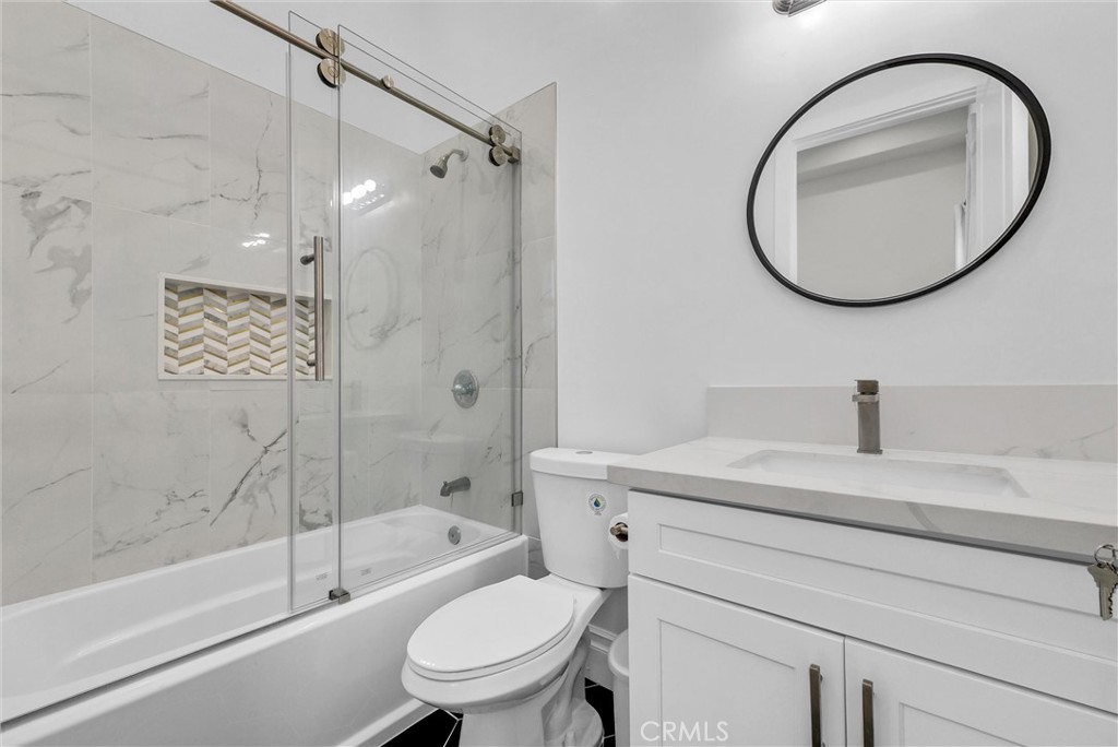 451 Avenida Esplendor Walnut, CA 91789 - Photo 7 of 51 a bathroom with a sink a toilet and a mirror