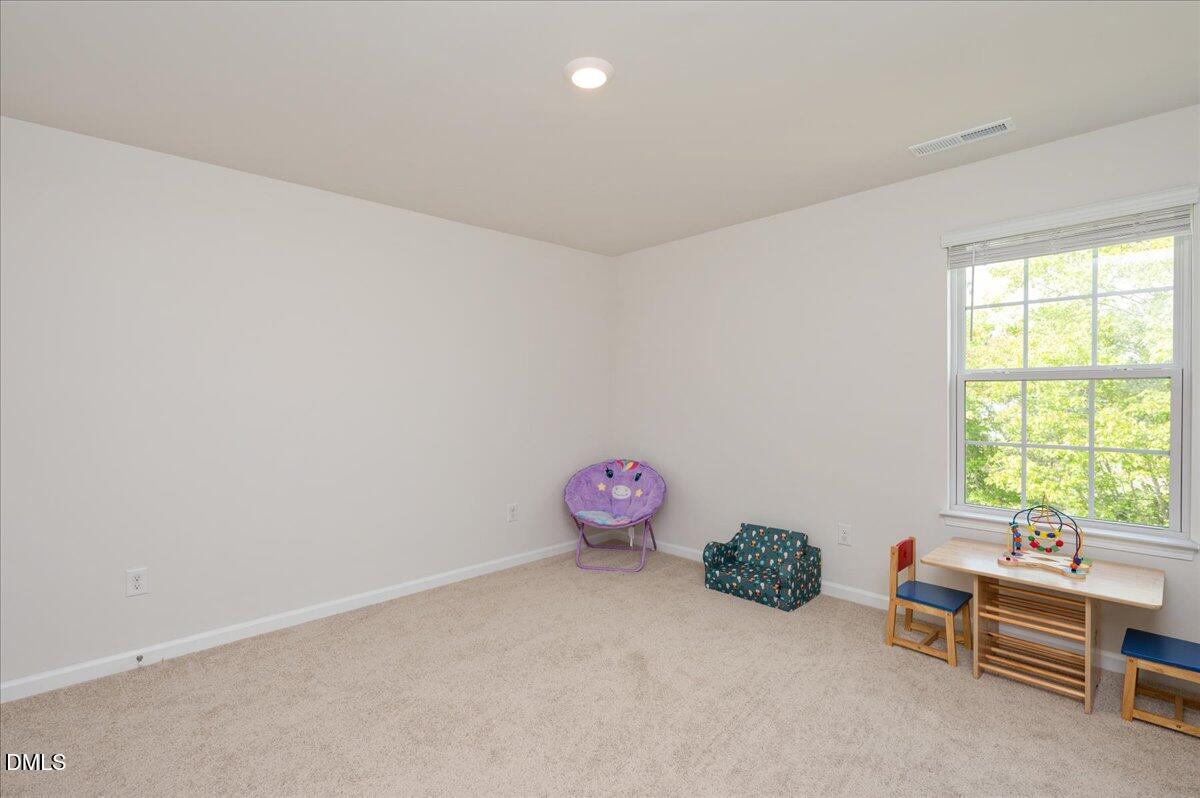 10 Whispering Willow Circle Youngsville, NC 27596 - Photo 16 of 28 a room with toys and a window