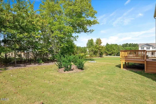 a view of a yard with an outdoor space