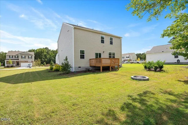 a view of swimming pool with outdoor seating and plants