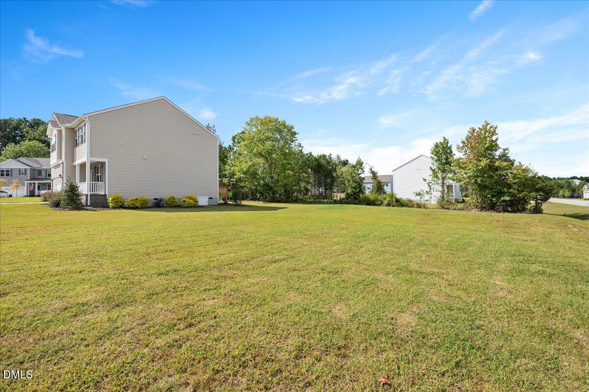 10 Whispering Willow Circle Youngsville, NC 27596 - Photo 3 of 28 a view of an ocean from a yard