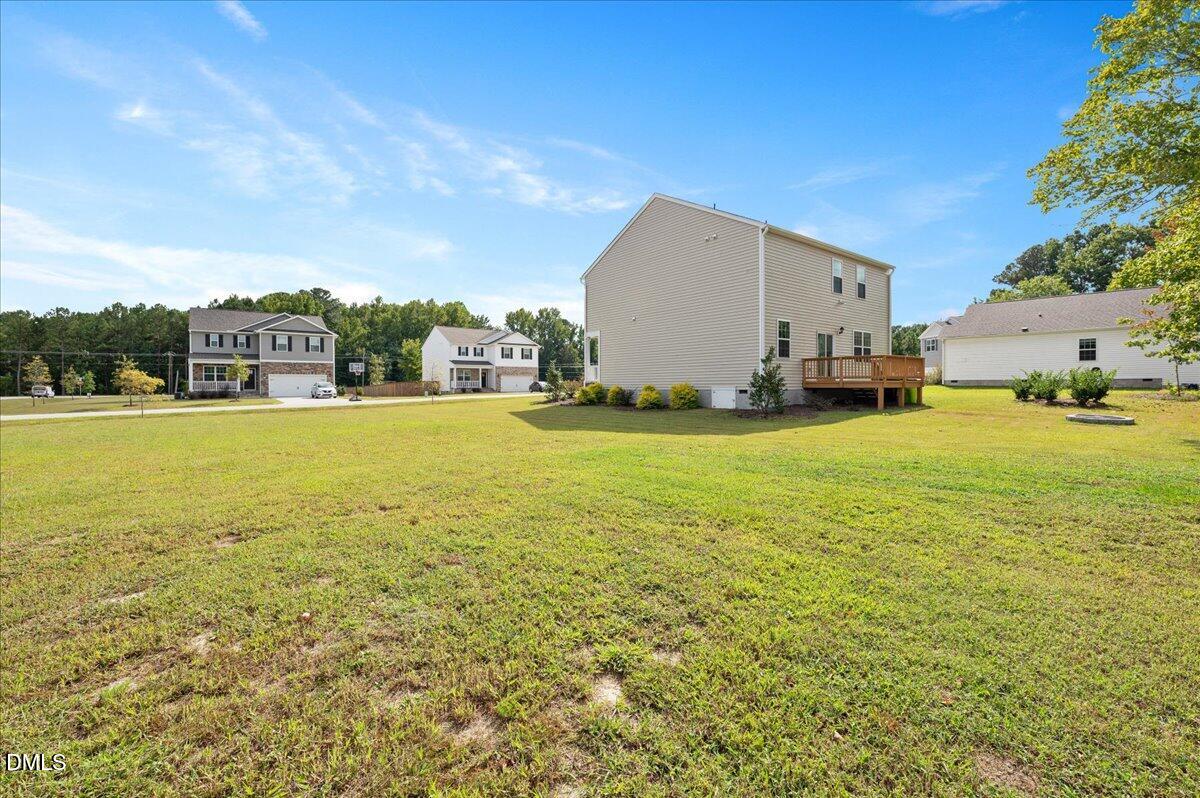 10 Whispering Willow Circle Youngsville, NC 27596 - Photo 4 of 28 a view of a ocean with a big yard