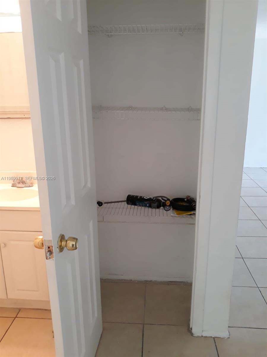 4380 Lakewood Road, Unit 4380 Lake Worth, FL 33461 - Photo 11 of 17 a view of walk in closet