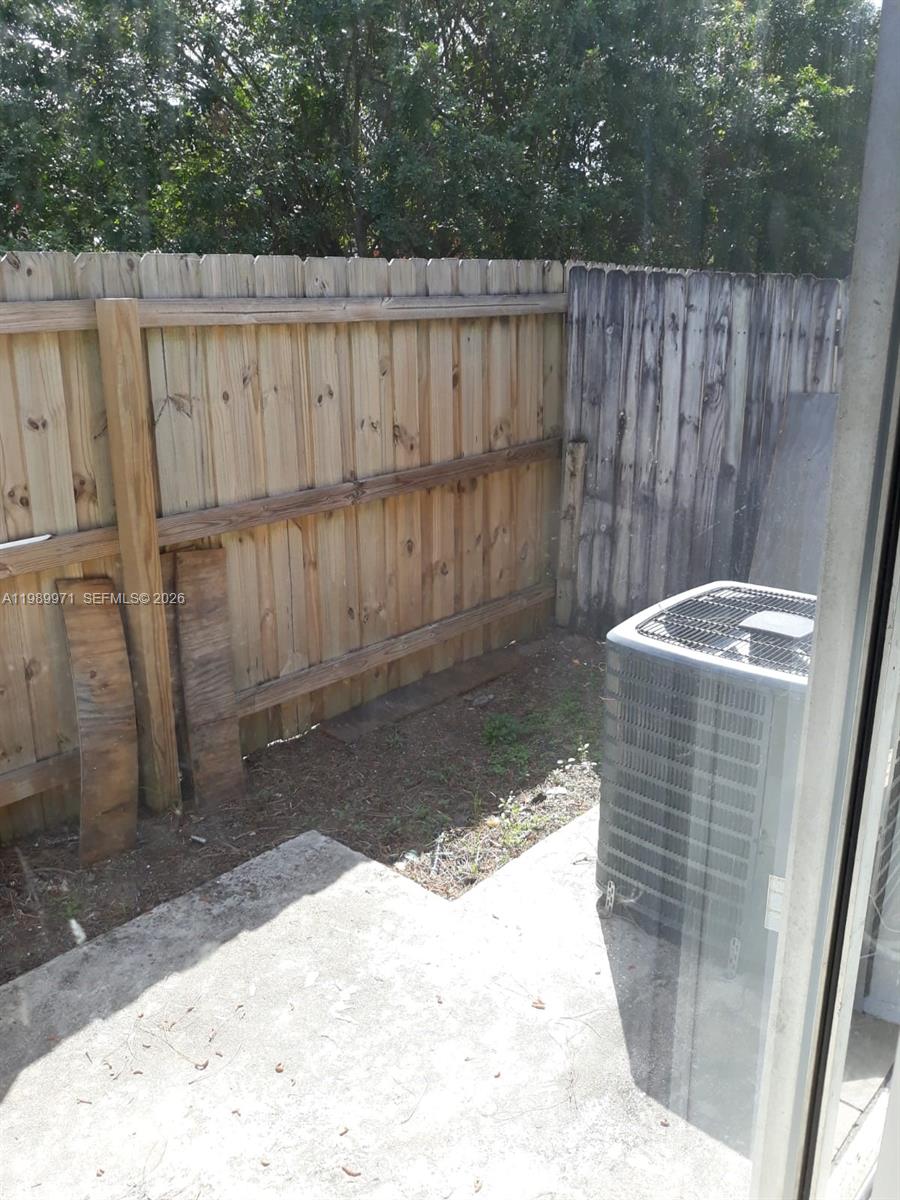 4380 Lakewood Road, Unit 4380 Lake Worth, FL 33461 - Photo 2 of 17 a view of a backyard