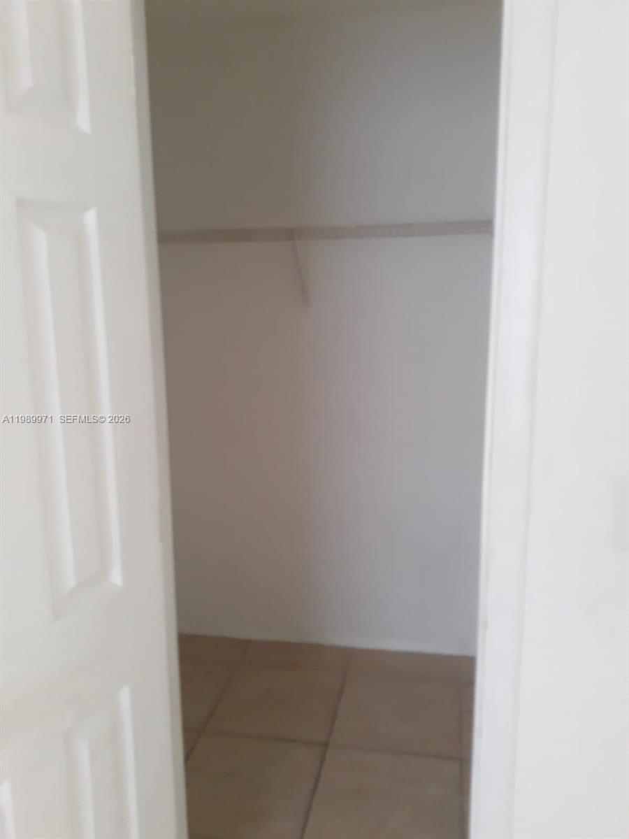 4380 Lakewood Road, Unit 4380 Lake Worth, FL 33461 - Photo 4 of 17 a view of cupboard