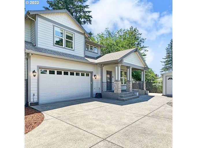 12614 Southeast Tibbetts Street Portland, OR 97236 - Photo 1 of 31 a view of a house with a yard and potted plants