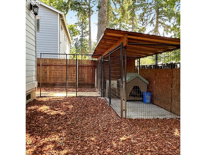12614 Southeast Tibbetts Street Portland, OR 97236 - Photo 28 of 31 a view of a backyard