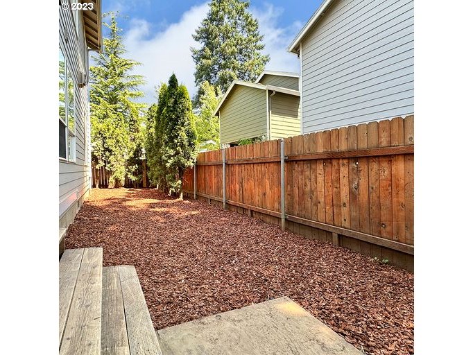 12614 Southeast Tibbetts Street Portland, OR 97236 - Photo 29 of 31 a view of a backyard