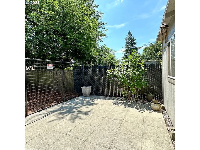 12614 Southeast Tibbetts Street Portland, OR 97236 - Photo 4 of 31 a view of a backyard