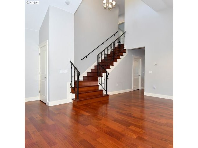 12614 Southeast Tibbetts Street Portland, OR 97236 - Photo 6 of 31 a view of entryway and hall with wooden floor