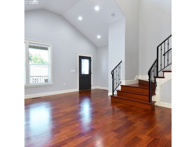 12614 Southeast Tibbetts Street Portland, OR 97236 - Photo 7 of 31 a view of an entryway with wooden floor