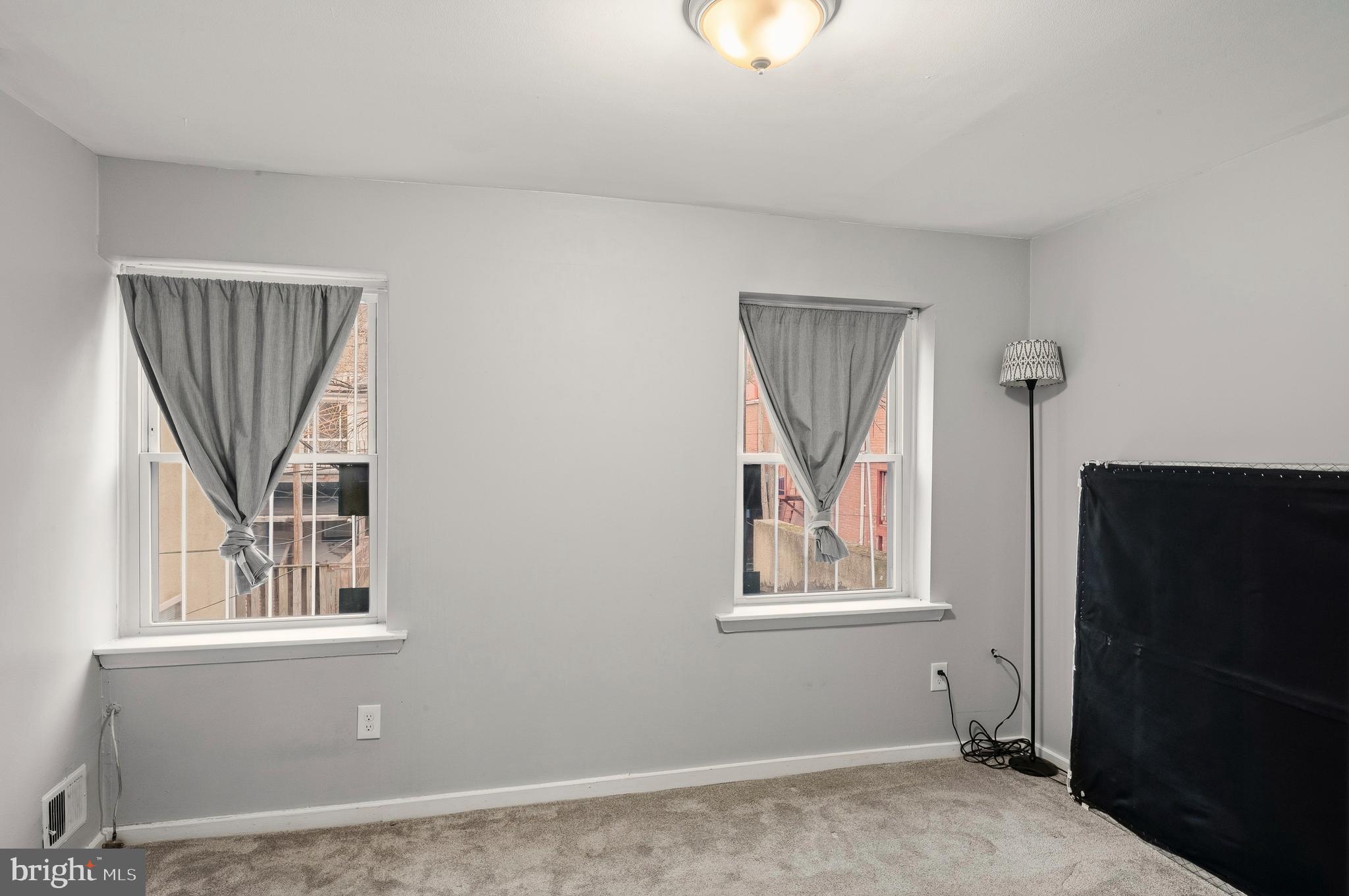 636 Portland Street Baltimore, MD 21230 - Photo 12 of 20 an entryway and a window in a room