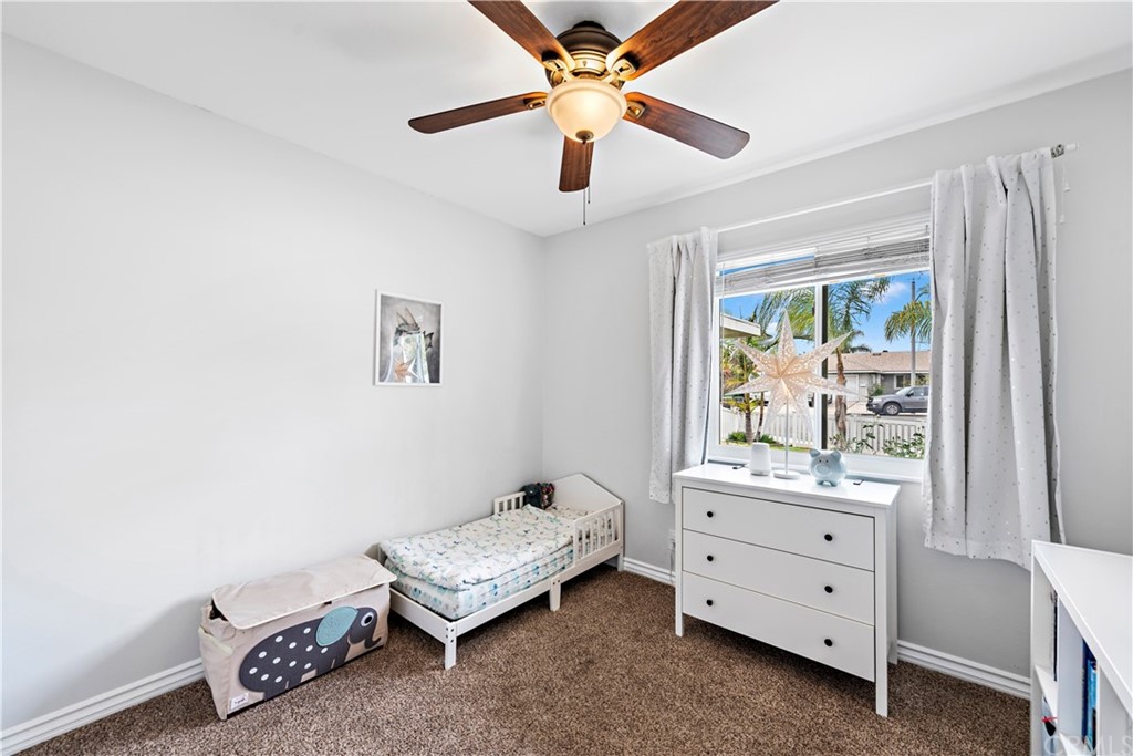 3040 Harding Way Costa Mesa, CA 92626 - Photo 12 of 17 a room with furniture and a window