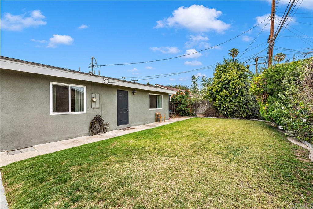 3040 Harding Way Costa Mesa, CA 92626 - Photo 16 of 17 a view of a backyard with plants and a patio