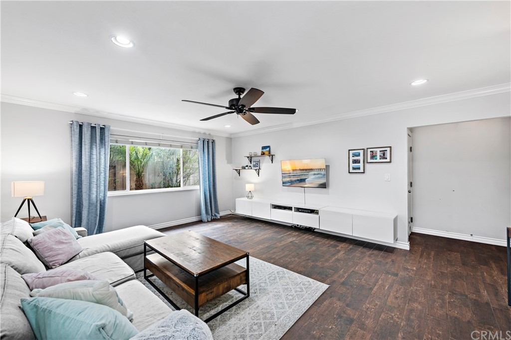 3040 Harding Way Costa Mesa, CA 92626 - Photo 4 of 17 a living room with furniture and a large window