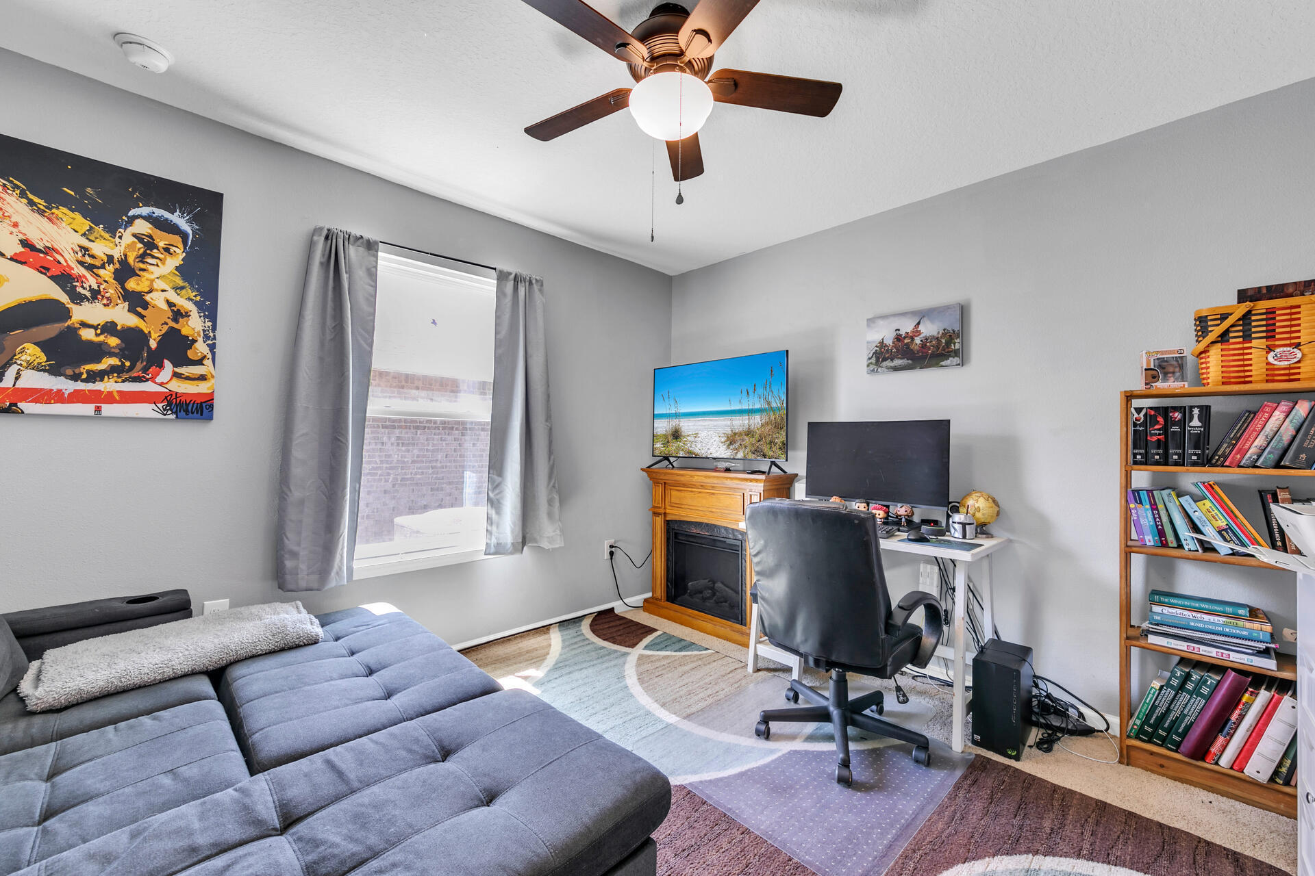 507 Merganser Way Crestview, FL 32539 - Photo 14 of 45 a living room with furniture and a book shelf