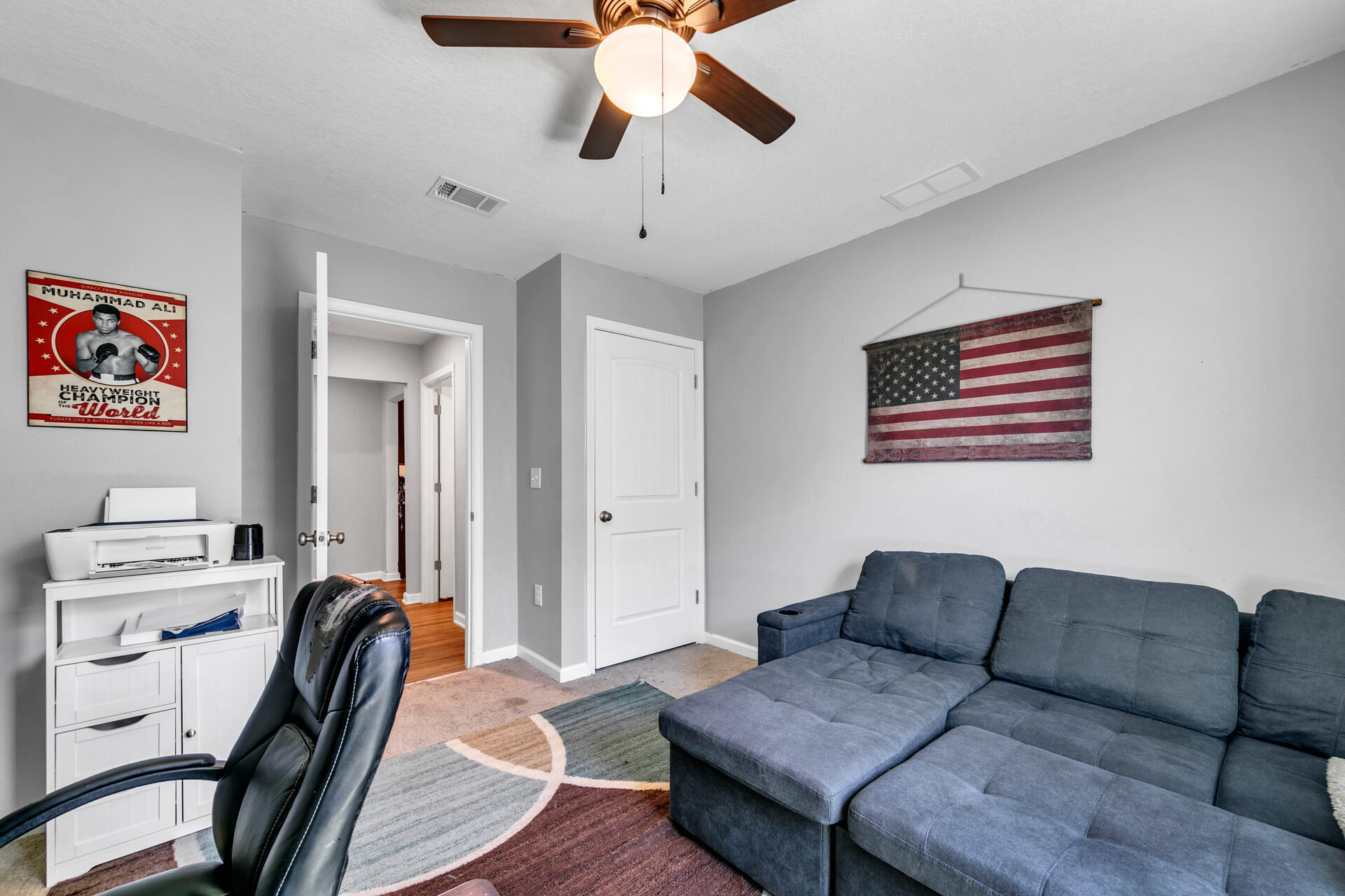 507 Merganser Way Crestview, FL 32539 - Photo 15 of 45 a living room with furniture and a chandelier