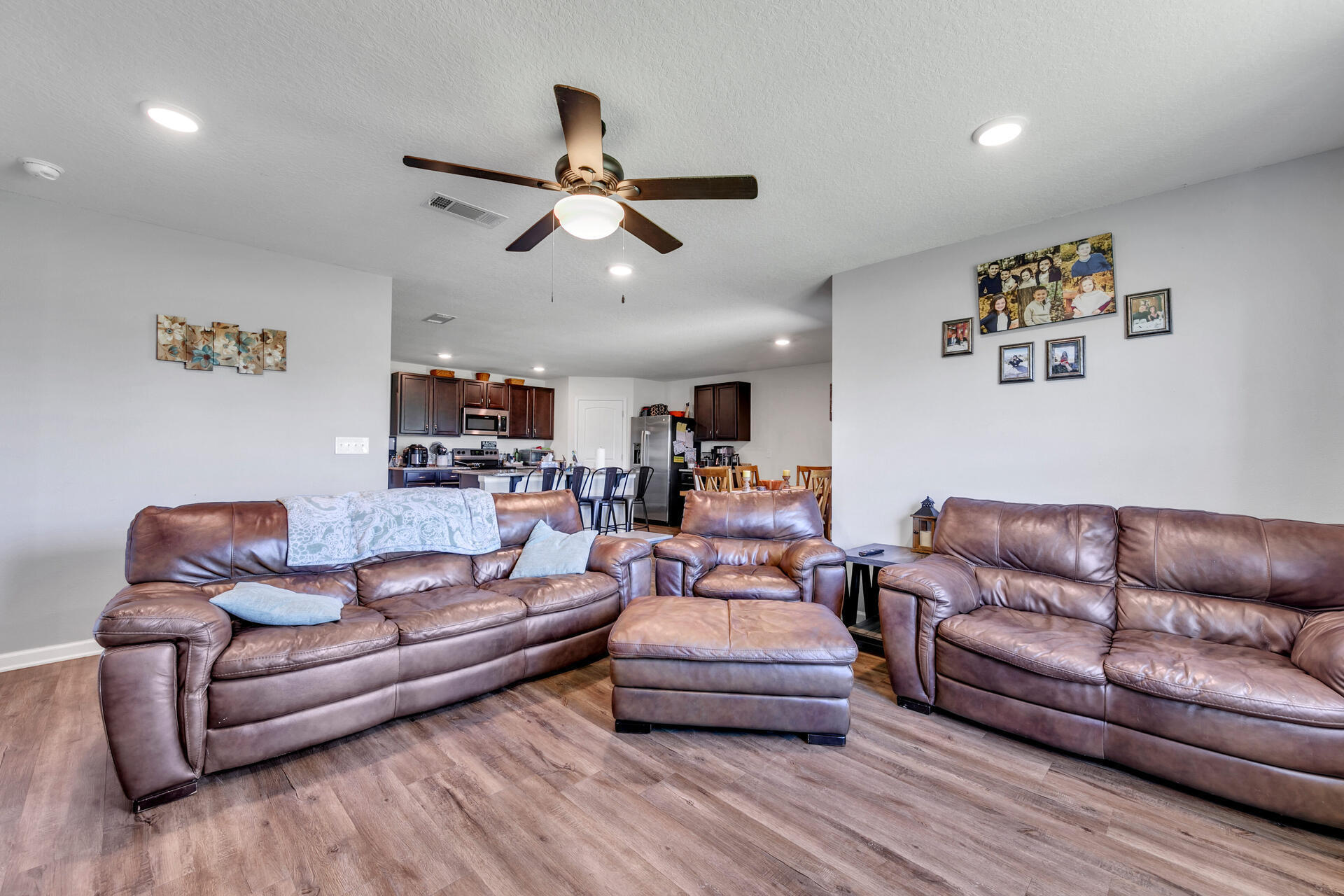 507 Merganser Way Crestview, FL 32539 - Photo 25 of 45 a living room with furniture and a wooden floor