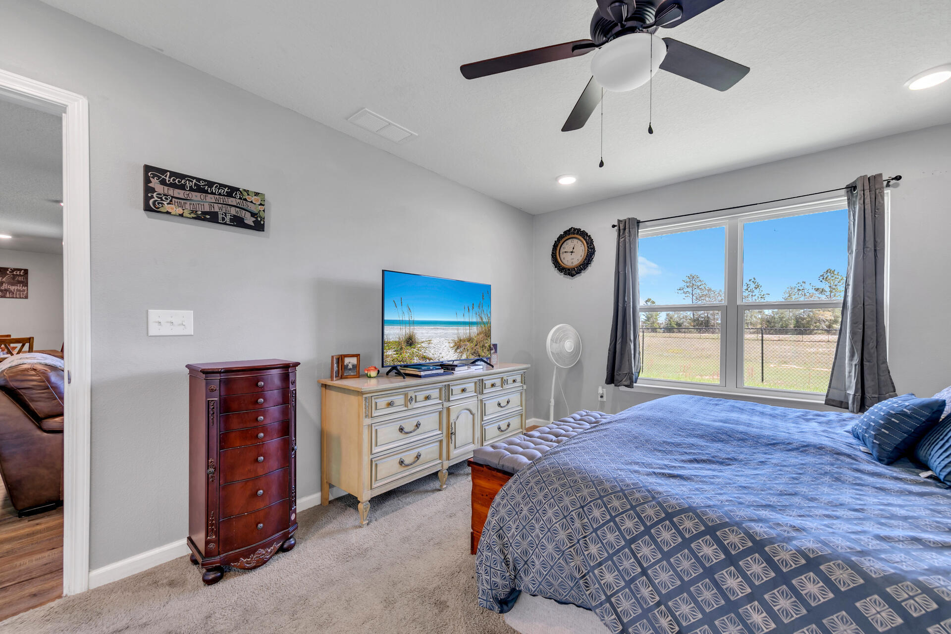 507 Merganser Way Crestview, FL 32539 - Photo 28 of 45 a bedroom with a bed dresser and a window