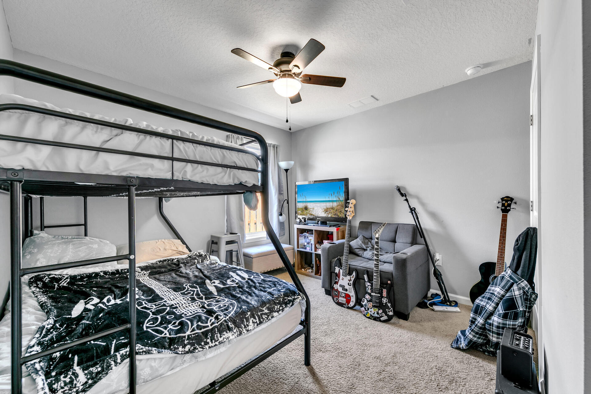 507 Merganser Way Crestview, FL 32539 - Photo 9 of 45 a bed room with a bed and a ceiling fan