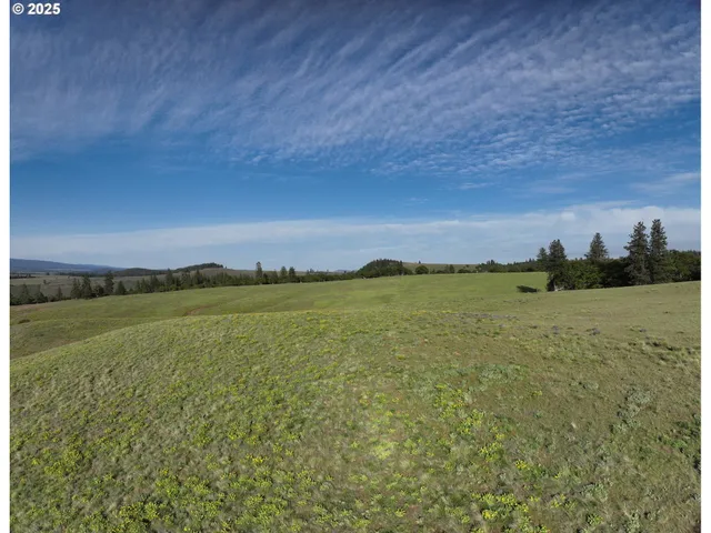 a view of an ocean and mountain
