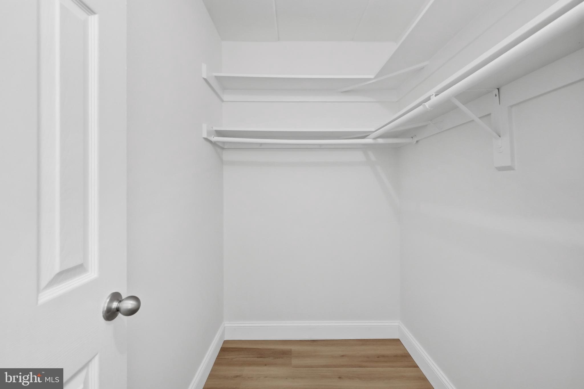 2316 Freetown Court, Unit 10/1B Reston, VA 20191 - Photo 18 of 36 Master Bedroom Walk-In Closet
