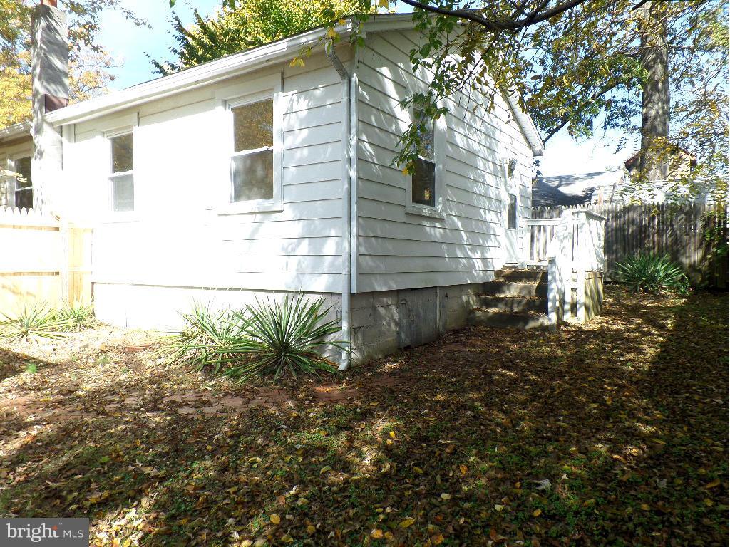 fenced back yard, shed