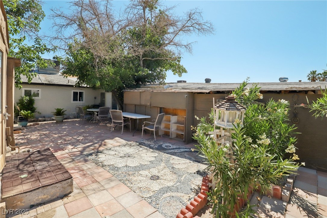 4027 Maple Hill Road Las Vegas, NV 89115 - Photo 38 of 46 View of patio with outdoor dining space