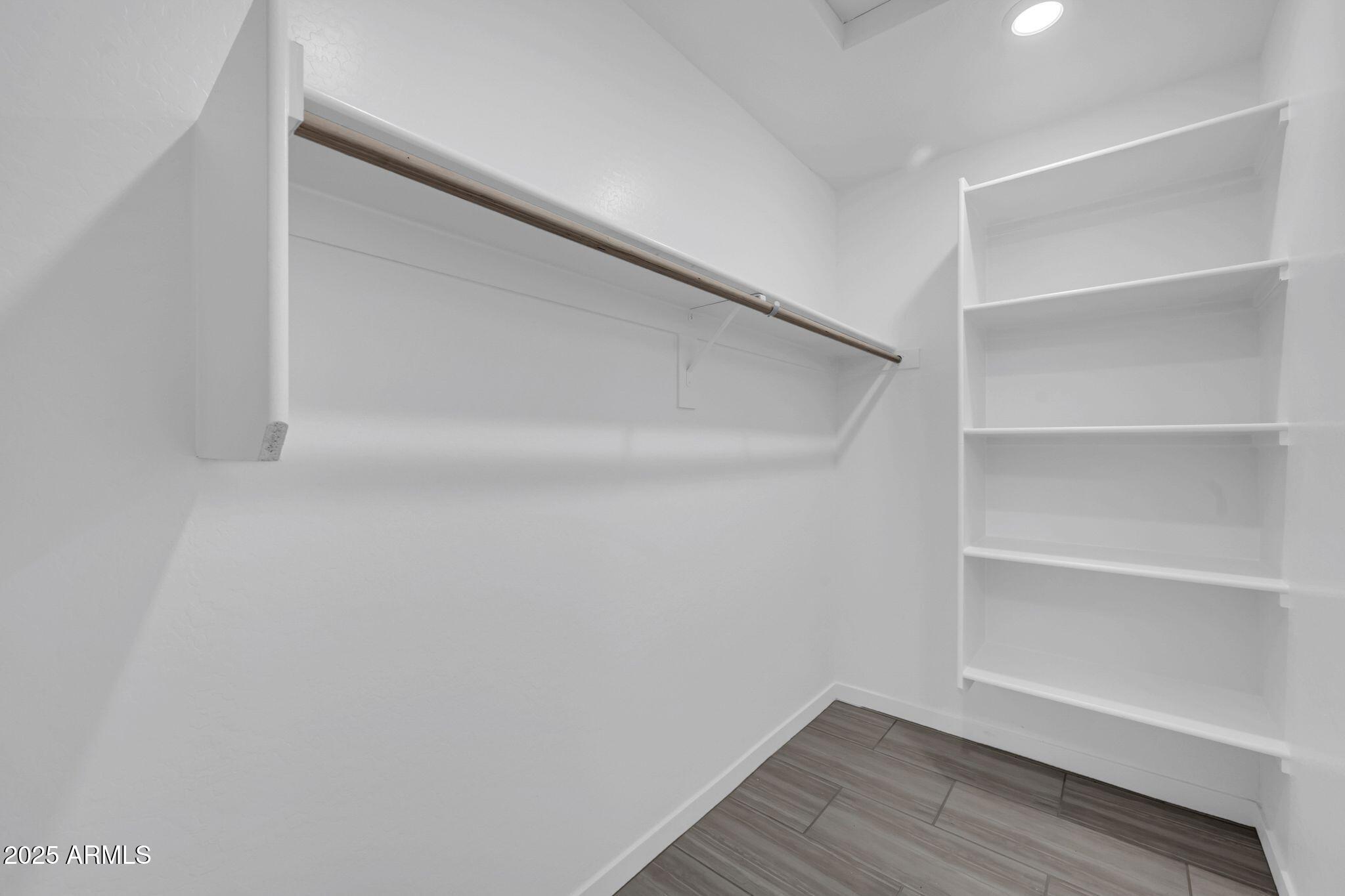 13215 South Laredo Road Arizona City, AZ 85123 - Photo 12 of 31 a view of an empty walk in closet