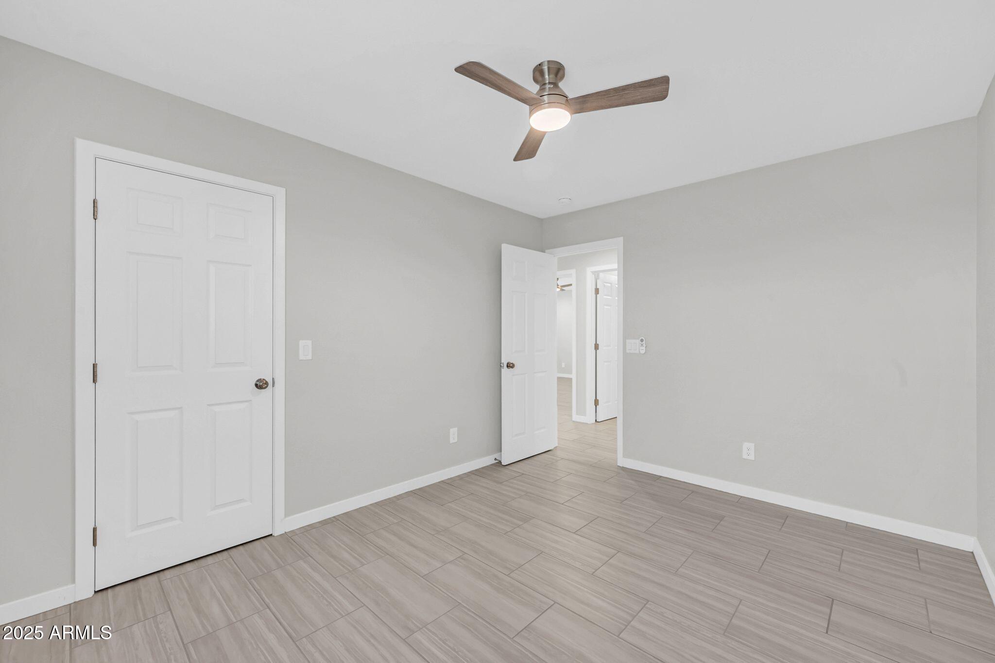 13215 South Laredo Road Arizona City, AZ 85123 - Photo 23 of 31 wooden floor in an empty room