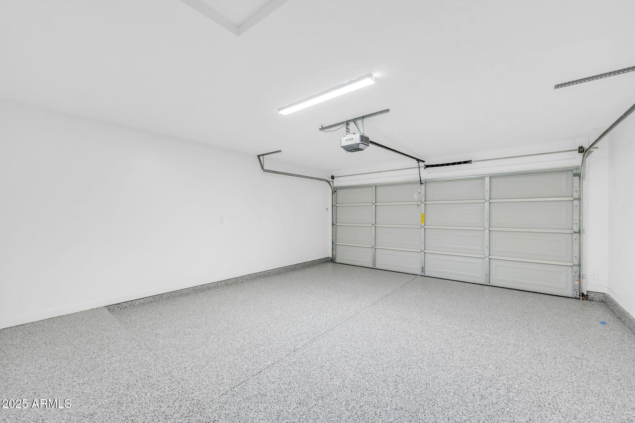 13215 South Laredo Road Arizona City, AZ 85123 - Photo 30 of 31 an empty room with a ceiling fan and wooden floor