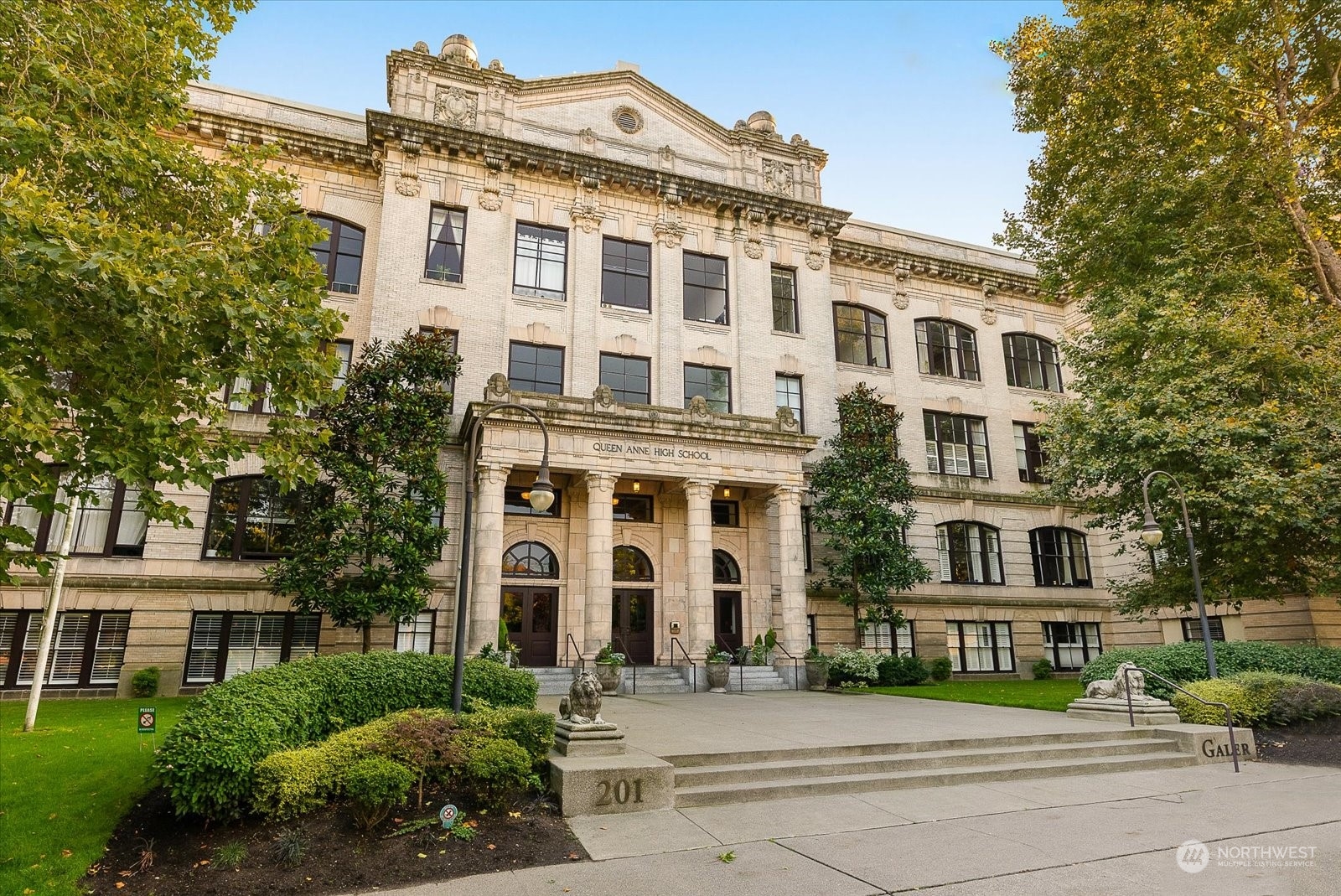 a front view of a building with street view