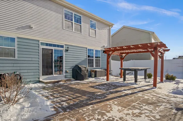a view of a house with a patio