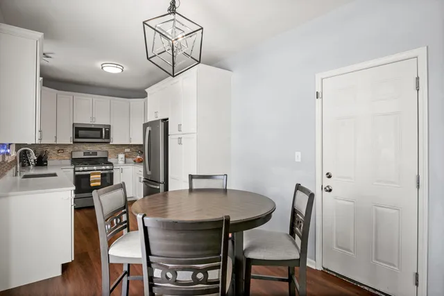 a view of a dining room with furniture