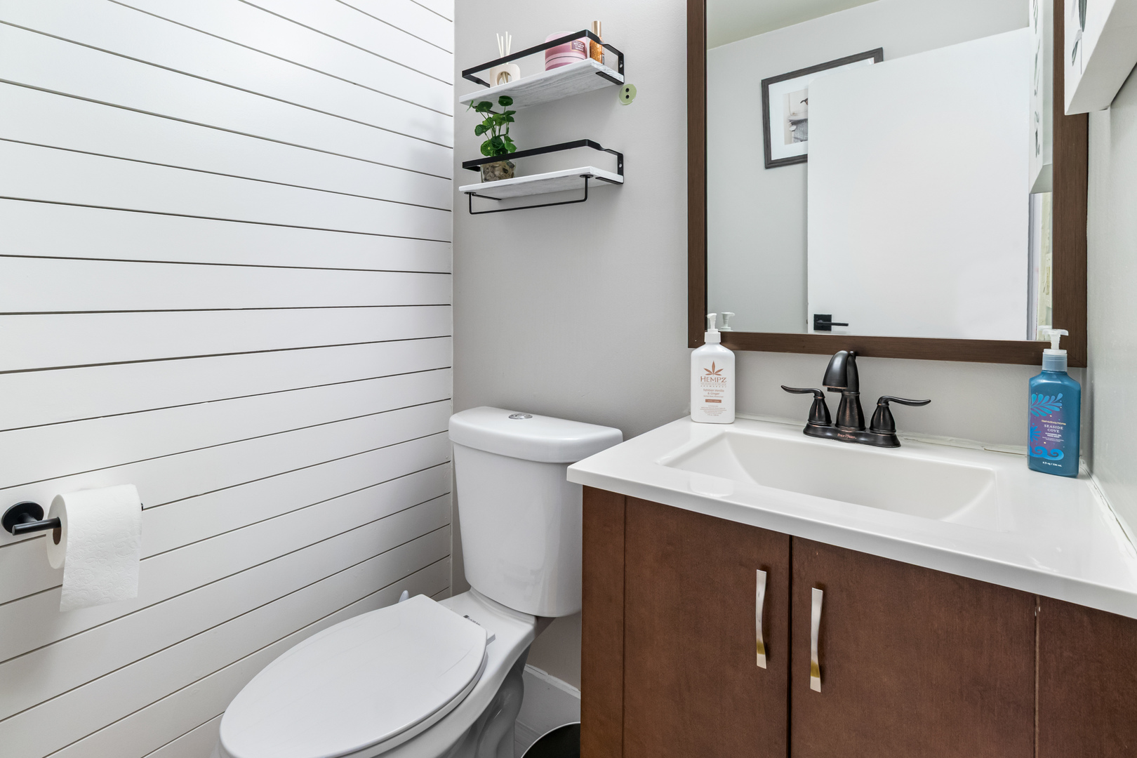 7 Purchase Court Bolingbrook, IL 60440 - Photo 14 of 23 a bathroom with a toilet a sink and mirror