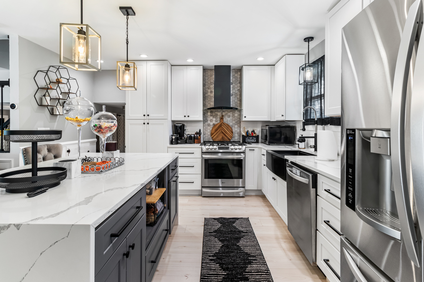 7 Purchase Court Bolingbrook, IL 60440 - Photo 17 of 23 a kitchen with stainless steel appliances a sink a stove and a refrigerator