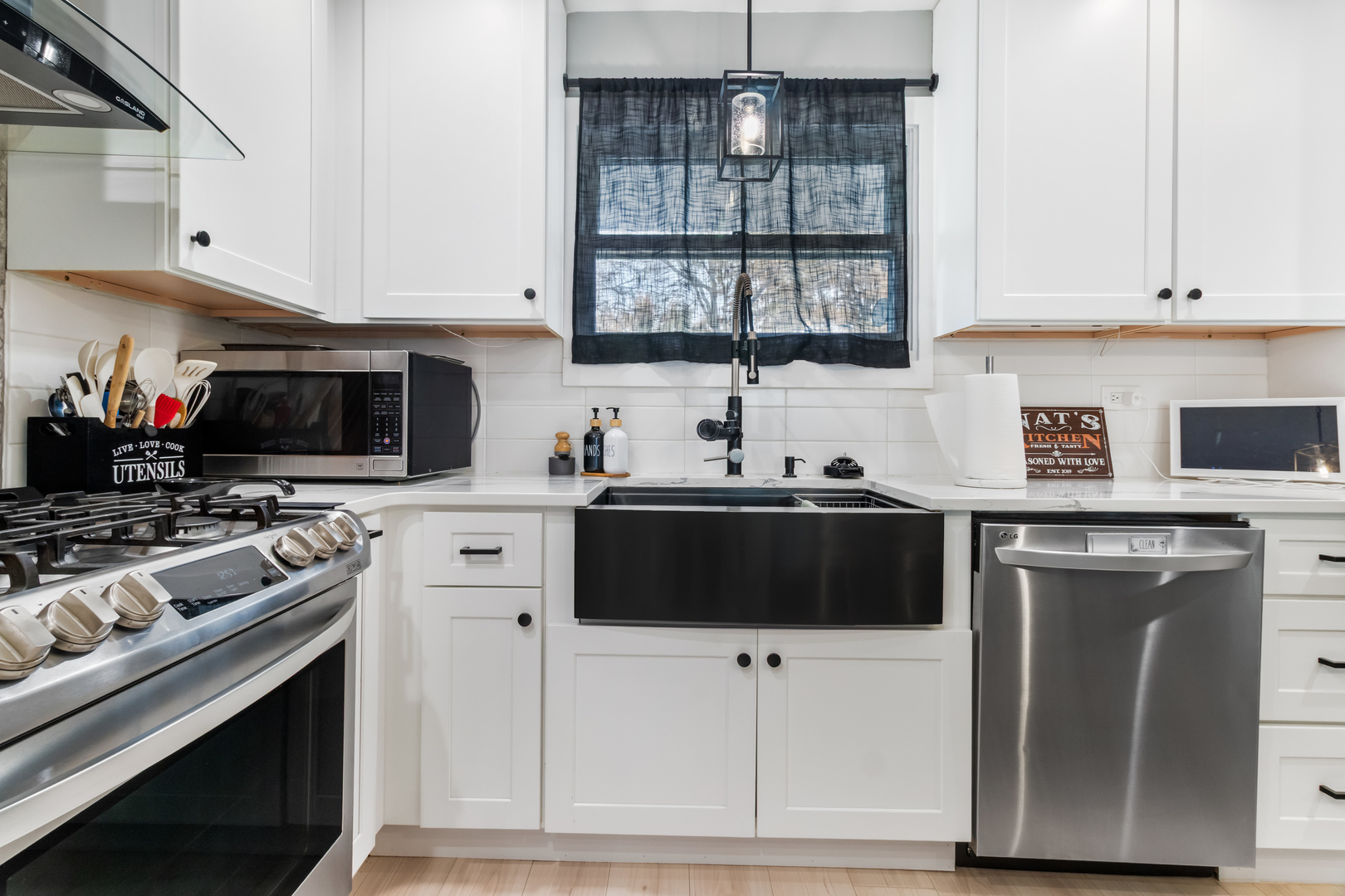 7 Purchase Court Bolingbrook, IL 60440 - Photo 18 of 23 a kitchen with stainless steel appliances a stove microwave and refrigerator