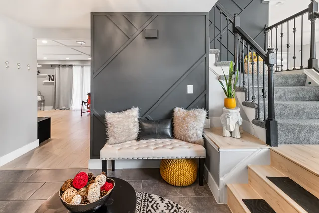 a living room with furniture and a couch