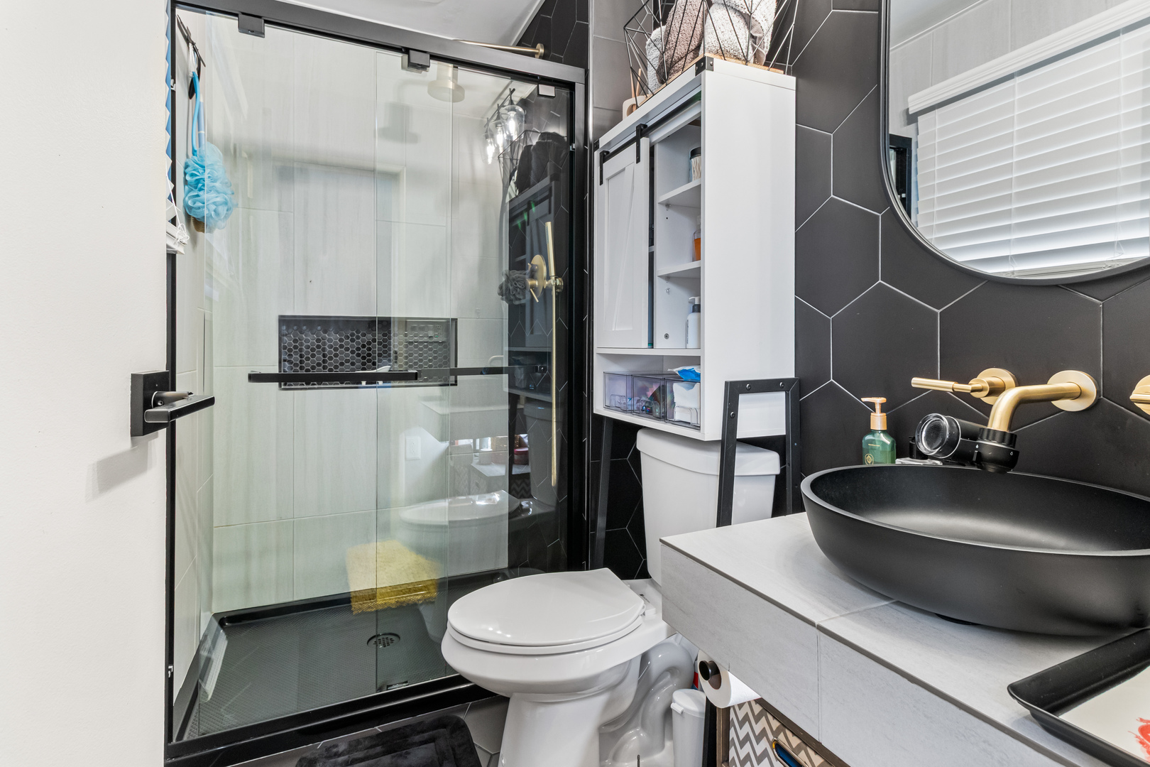 7 Purchase Court Bolingbrook, IL 60440 - Photo 9 of 23 a bathroom with a sink toilet and shower
