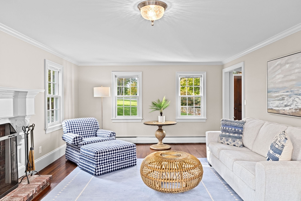 101 Nichols Road Cohasset, MA 02025 - Photo 13 of 34 a living room with furniture and a large window