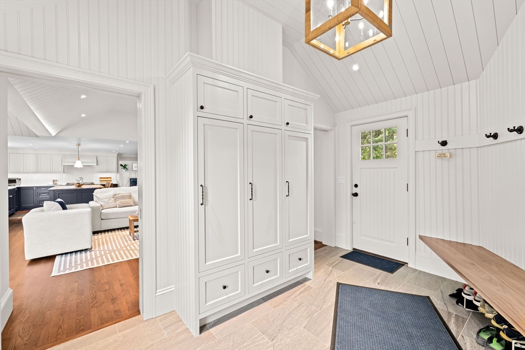 101 Nichols Road Cohasset, MA 02025 - Photo 2 of 34 a living room with furniture and a table