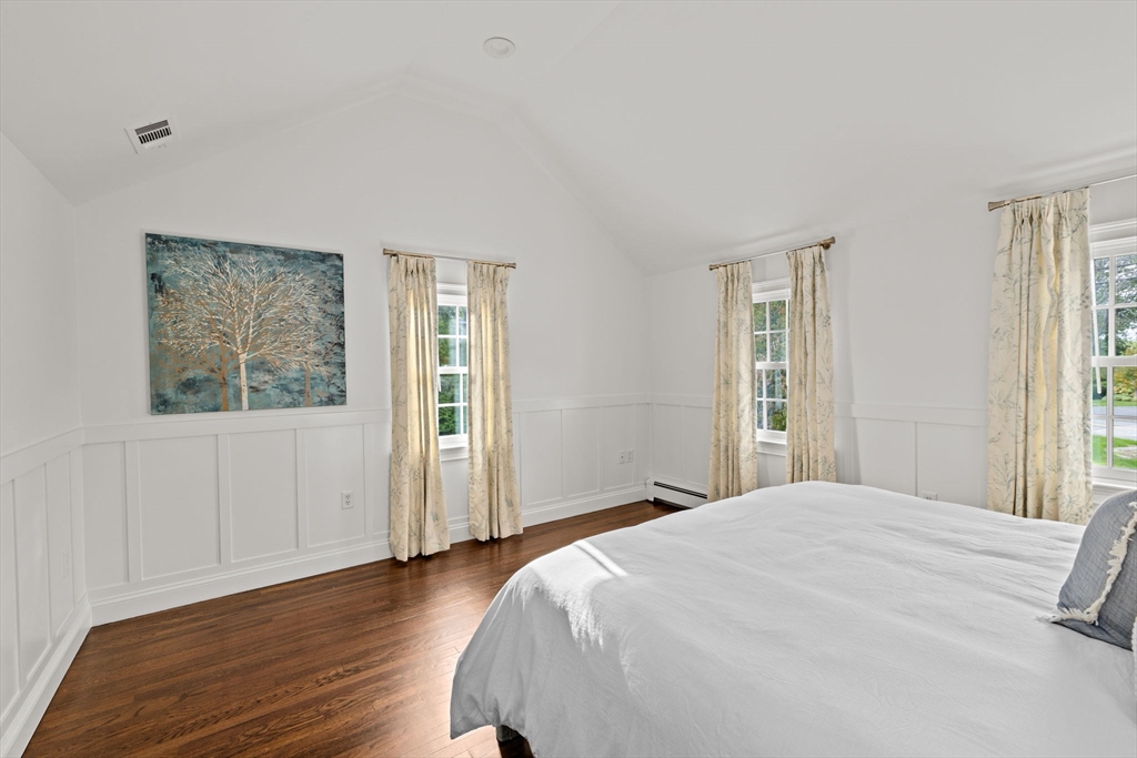 101 Nichols Road Cohasset, MA 02025 - Photo 22 of 34 a bedroom with a bed and a window