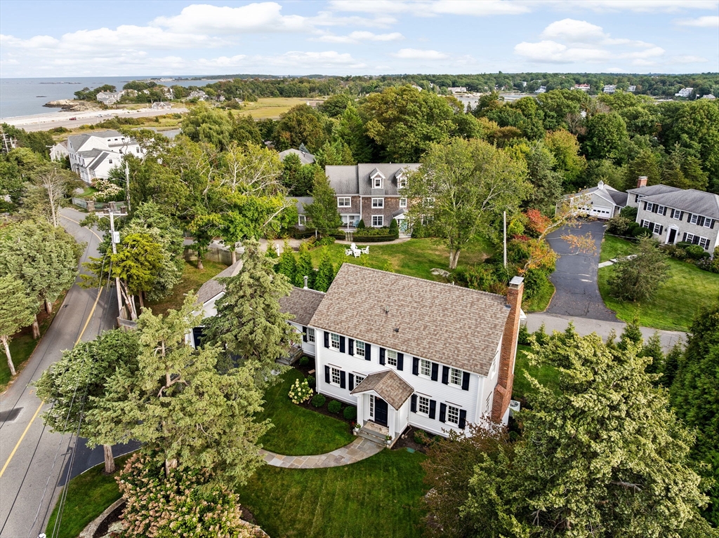 101 Nichols Road Cohasset, MA 02025 - Photo 31 of 34 an aerial view of houses with a yard