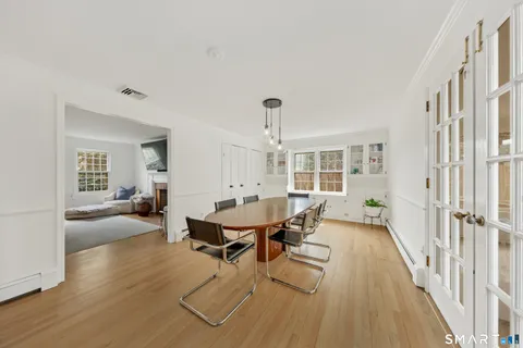 a living room with furniture and a table