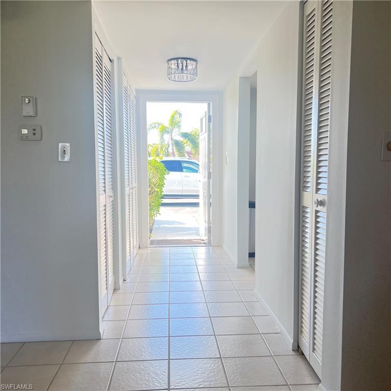 197 Harrison Road, Unit 3 Naples, FL 34112 - Photo 6 of 14 a view of an entryway and an empty room