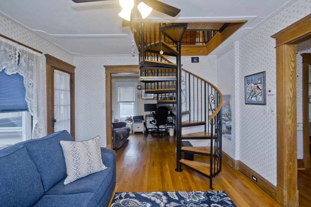 22-24 Eldridge Street Springfield, MA 01108 - Photo 18 of 41 a living room with furniture and wooden floor