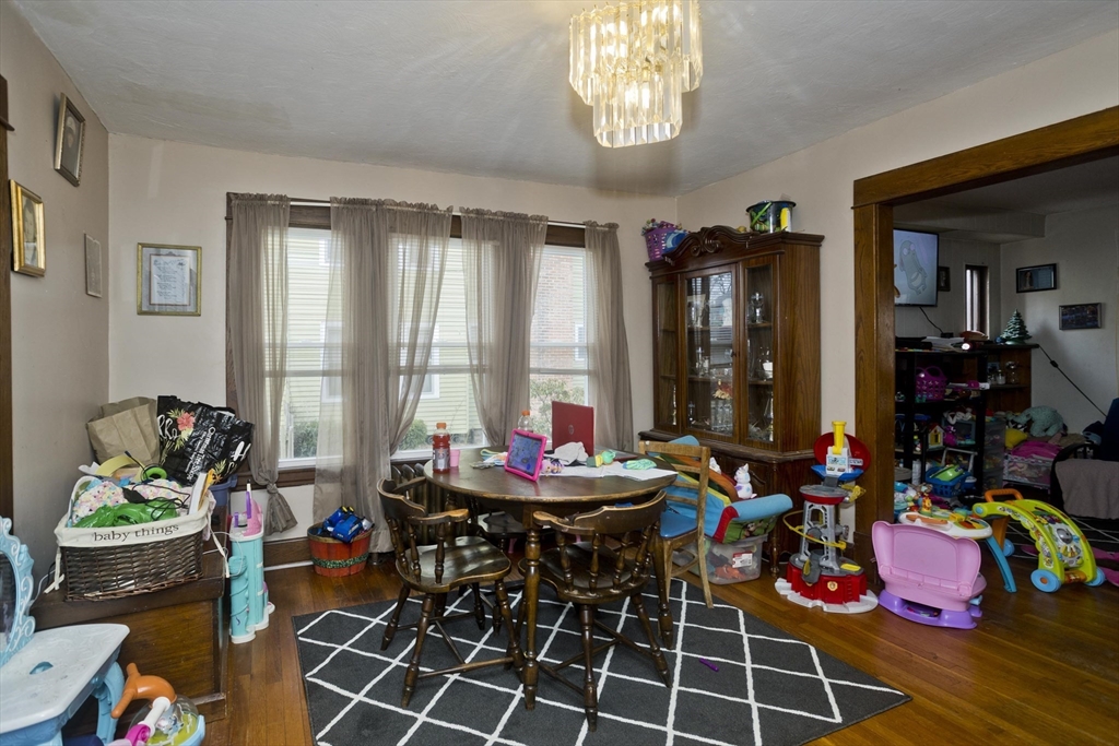 22-24 Eldridge Street Springfield, MA 01108 - Photo 38 of 41 a room with lots of stuff and couch