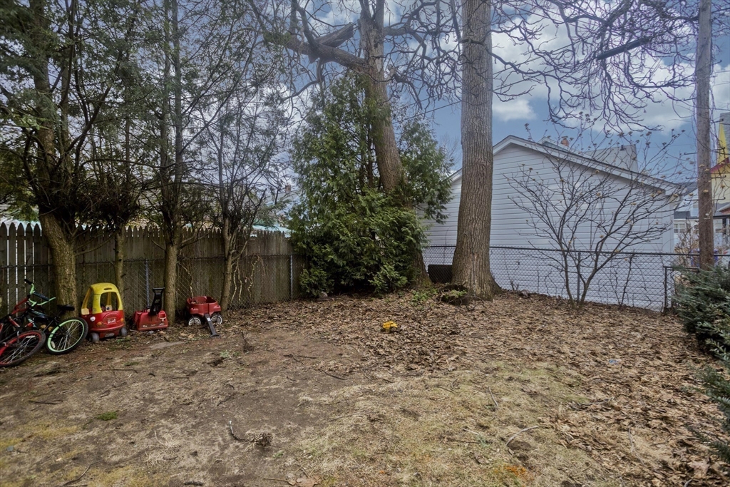 22-24 Eldridge Street Springfield, MA 01108 - Photo 5 of 41 a view of outdoor space with garden
