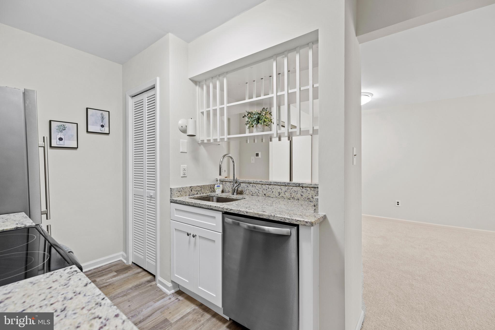 5821 Royal Ridge Drive, Unit E Springfield, VA 22152 - Photo 6 of 18 New countertops in the kitchen and the bathroom